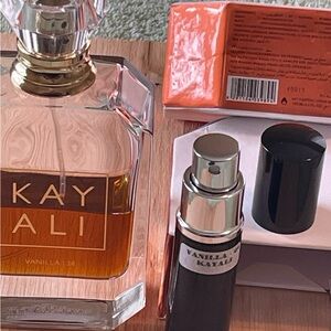 KAYALI Vanilla | 28 – 10 ml Black Aluminum Reusable Travel Spray